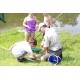 Park staff help children net creatures from Woodstock Pond. Credit: Virginia State Parks